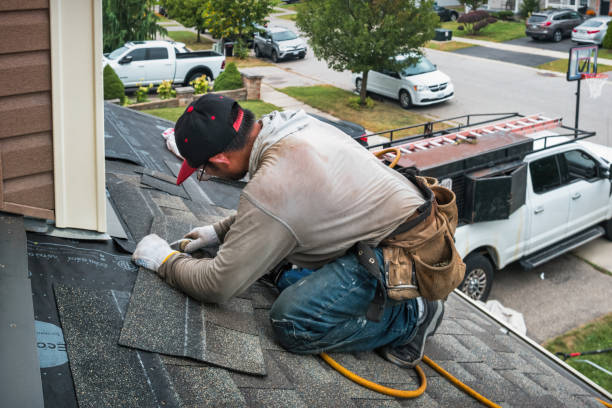 Professional Roofing technician working in Scottsville, NY